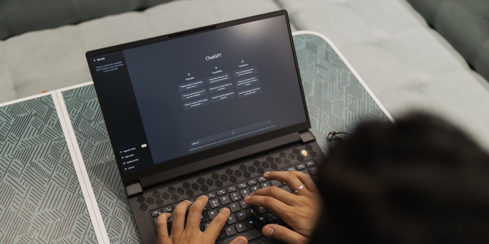 Person Using ChatGPT on Laptop