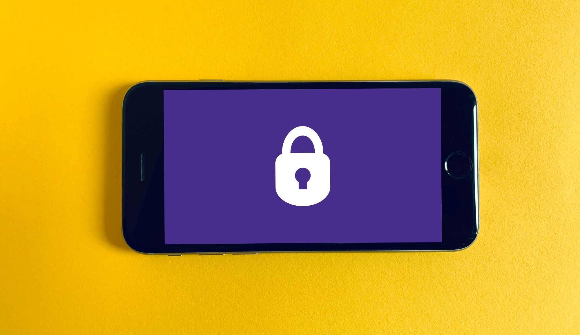 lock icon on phone with yellow background